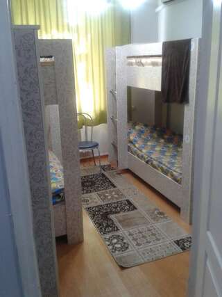 Хостелы Hostel64 Алматы Кровать в общем номере с 4 кроватями-1